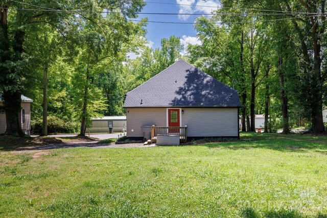 118 Sunset Dr, Clover, SC 29710 - back of house featuring a lawn and a shingled roof