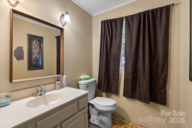 2701 Castes Dr, Pfafftown, NC 27040 - bathroom with crown molding, toilet, and vanity