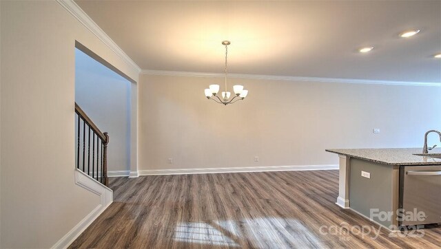 117 Sugg Trl, Weaverville, NC 28787 - kitchen with dark wood finished floors, a chandelier, crown molding, dishwasher, and pendant lighting