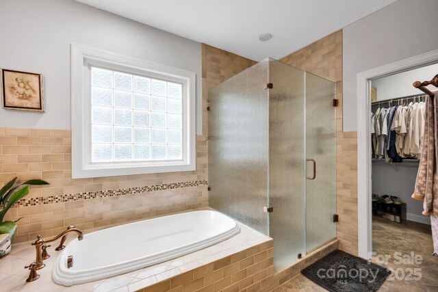 14505 Sunset Walk Ln, Huntersville, NC 28078 - full bathroom with a spacious closet, a shower stall, and a garden tub