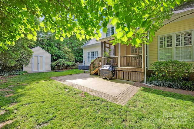 14505 Sunset Walk Ln, Huntersville, NC 28078 - view of green lawn featuring a storage shed, an outbuilding, a patio area, and a deck