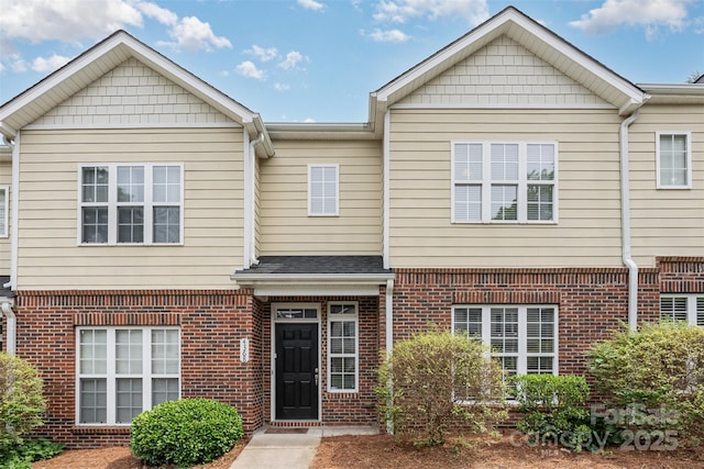 multi unit property featuring brick siding