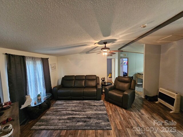 616/620 Pole Miller Ext, Brevard, NC 28712 - living room featuring heating unit, wood finished floors, ceiling fan, a textured ceiling, and vaulted ceiling