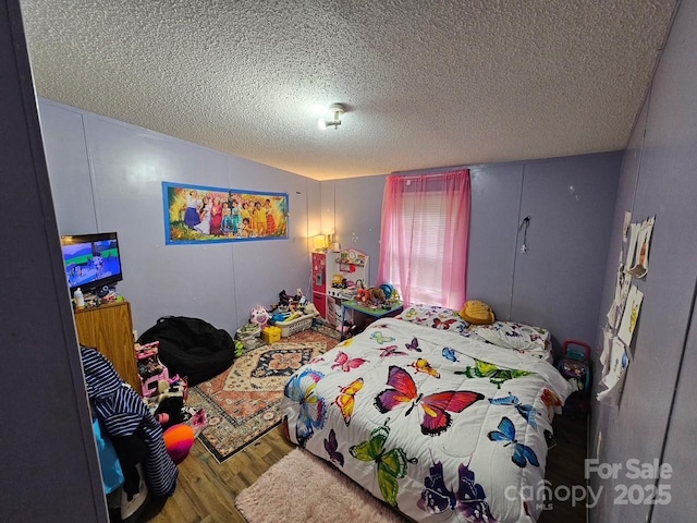 616/620 Pole Miller Ext, Brevard, NC 28712 - bedroom with wood finished floors, a textured ceiling, and lofted ceiling