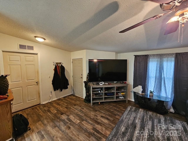 616/620 Pole Miller Ext, Brevard, NC 28712 - living room featuring a ceiling fan, wood finished floors, baseboards, a textured ceiling, and vaulted ceiling