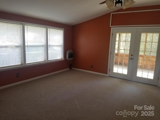 616/620 Pole Miller Ext, Brevard, NC 28712 - carpeted spare room with a ceiling fan, lofted ceiling, heating unit, french doors, and baseboards