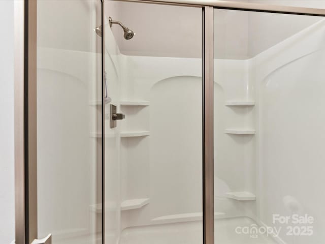 bathroom featuring a stall shower