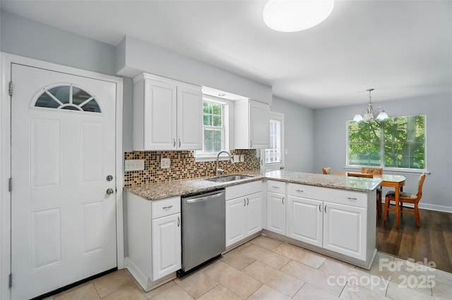 8014 Sherington Way, Charlotte, NC 28227 - kitchen featuring stainless steel dishwasher, a sink, a peninsula, white cabinetry, and light stone counters