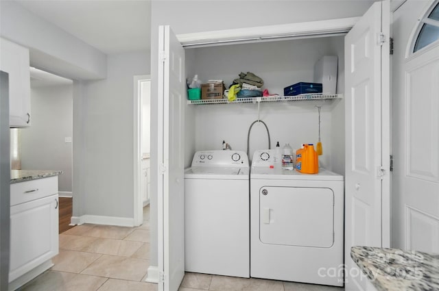 8014 Sherington Way, Charlotte, NC 28227 - washroom featuring washer and clothes dryer, light tile patterned floors, and baseboards