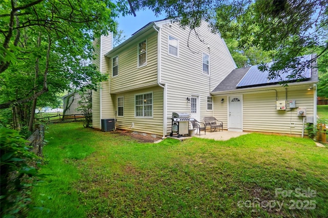 8014 Sherington Way, Charlotte, NC 28227 - rear view of property featuring a patio area, a chimney, and central AC