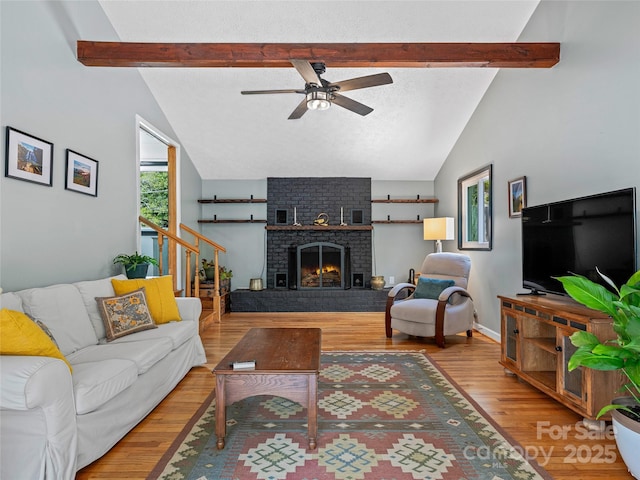 143 Mountain Crest Rd, Swannanoa, NC 28778 - living room with ceiling fan, wood finished floors, stairs, and a fireplace