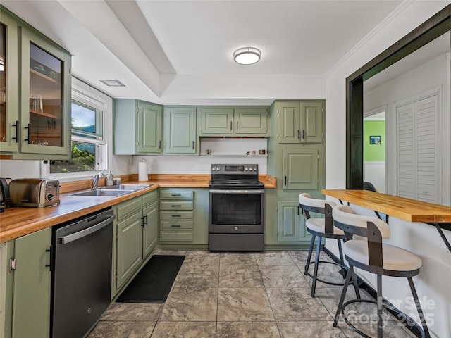143 Mountain Crest Rd, Swannanoa, NC 28778 - kitchen with stainless steel appliances, a sink, and green cabinets