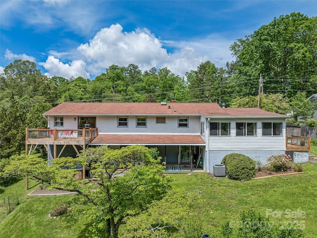 143 Mountain Crest Rd, Swannanoa, NC 28778 - rear view of house featuring a sunroom, a yard, and a deck