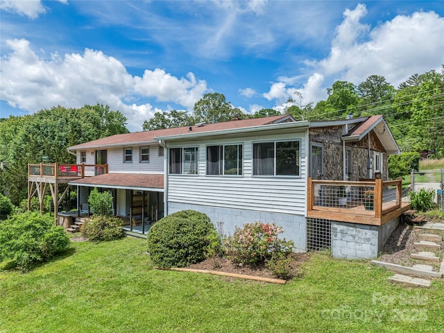143 Mountain Crest Rd, Swannanoa, NC 28778 - back of property with a yard and a wooden deck