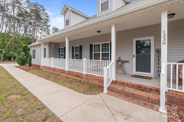 1230 Long Creek Ln, Salisbury, NC 28146 - property entrance with a porch and roof with shingles