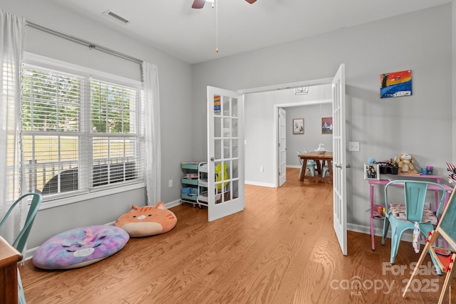 1230 Long Creek Ln, Salisbury, NC 28146 - playroom with french doors, light wood finished floors, a ceiling fan, and baseboards