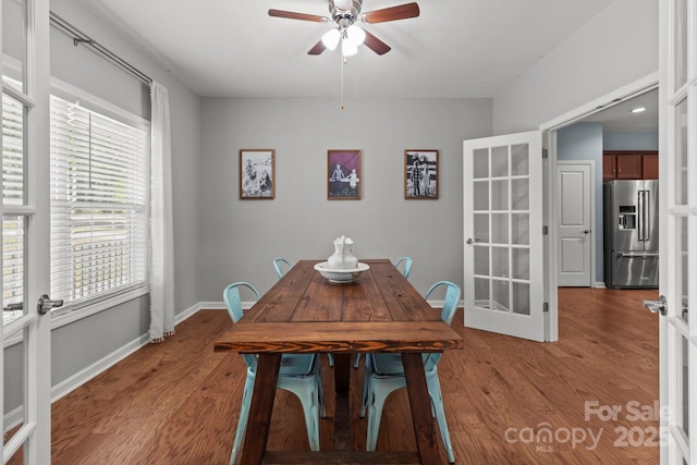 1230 Long Creek Ln, Salisbury, NC 28146 - dining area with a ceiling fan, french doors, wood finished floors, and baseboards