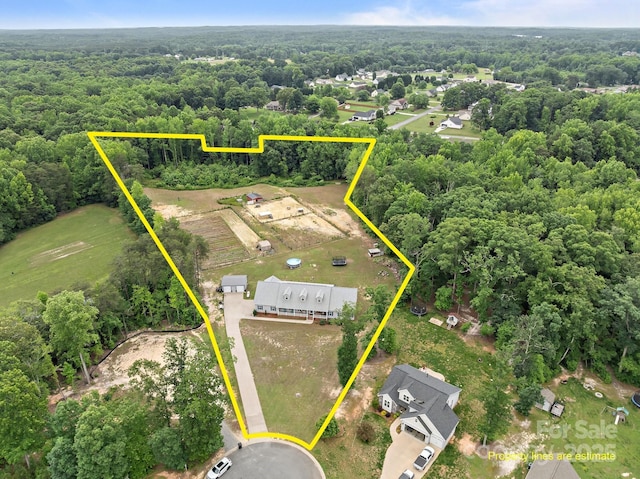 1230 Long Creek Ln, Salisbury, NC 28146 - aerial view of property and surrounding area with property parcel outlined and a heavily wooded area