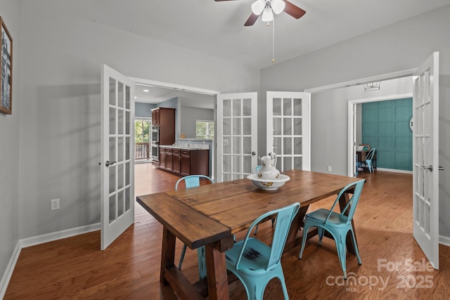 1230 Long Creek Ln, Salisbury, NC 28146 - dining room with french doors, a ceiling fan, wood finished floors, and baseboards
