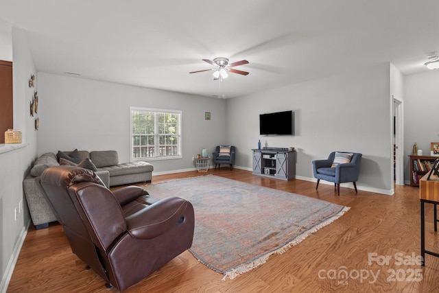 1230 Long Creek Ln, Salisbury, NC 28146 - living room featuring ceiling fan, wood finished floors, and baseboards
