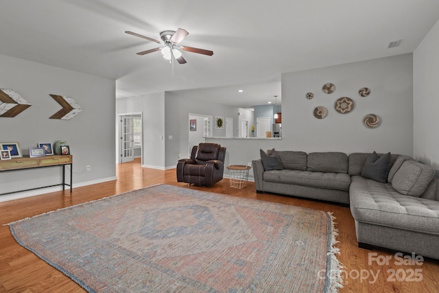 1230 Long Creek Ln, Salisbury, NC 28146 - living area featuring a ceiling fan, wood finished floors, and baseboards