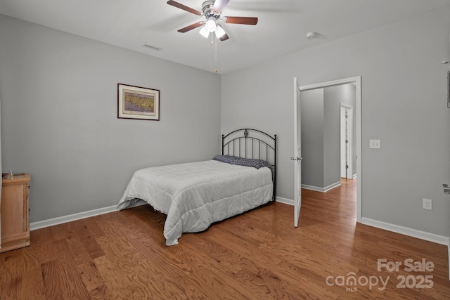 1230 Long Creek Ln, Salisbury, NC 28146 - bedroom with wood finished floors, baseboards, and ceiling fan