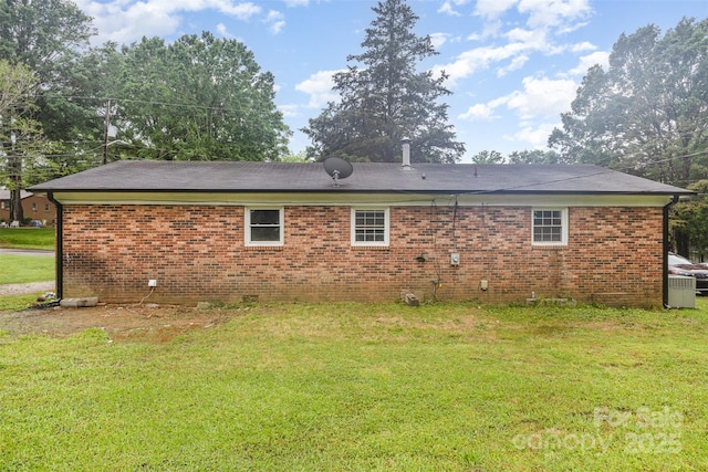 16 Green St, York, SC 29745 - back of house with a yard and brick siding