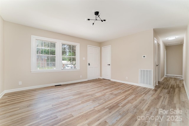 16 Green St, York, SC 29745 - spare room with light wood-style floors and baseboards