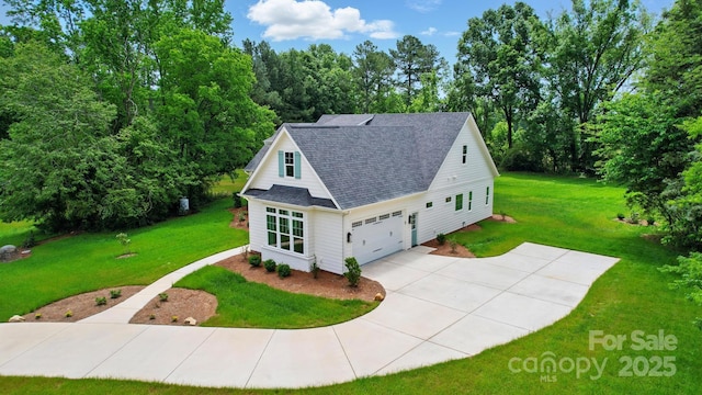 9311 Simpson Rd, Waxhaw, NC 28173 - view of home's exterior with roof with shingles, concrete driveway, and a yard