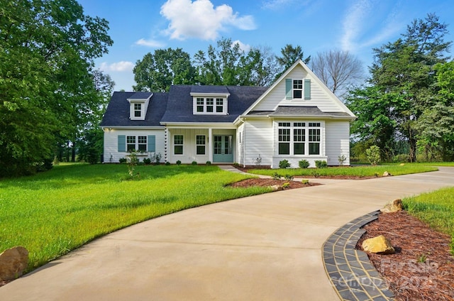 9311 Simpson Rd, Waxhaw, NC 28173 - view of front facade featuring a front yard, driveway, and a shingled roof