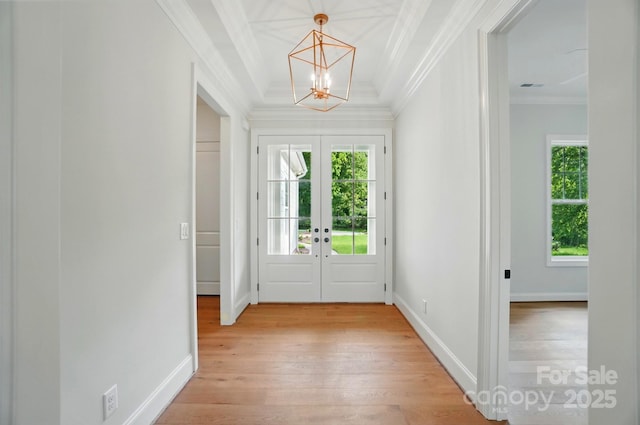 9311 Simpson Rd, Waxhaw, NC 28173 - foyer with crown molding, a chandelier, light wood-type flooring, baseboards, and french doors