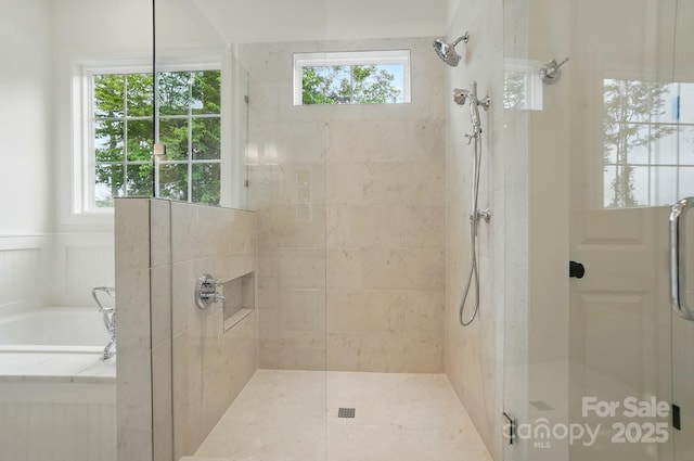 9311 Simpson Rd, Waxhaw, NC 28173 - full bath with a stall shower, healthy amount of natural light, and a bath