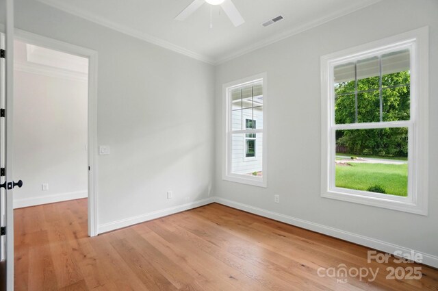 9311 Simpson Rd, Waxhaw, NC 28173 - spare room featuring ornamental molding, light wood-style flooring, baseboards, and ceiling fan