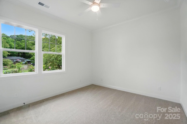 9311 Simpson Rd, Waxhaw, NC 28173 - unfurnished room with light colored carpet, baseboards, a ceiling fan, and ornamental molding