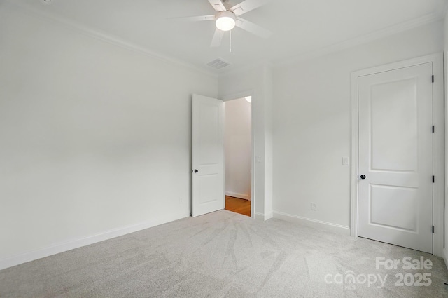 9311 Simpson Rd, Waxhaw, NC 28173 - unfurnished bedroom featuring crown molding, carpet, baseboards, and ceiling fan