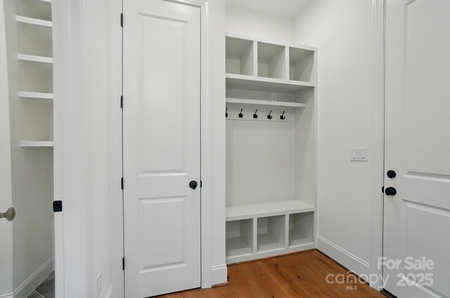 9311 Simpson Rd, Waxhaw, NC 28173 - mudroom with wood finished floors and baseboards