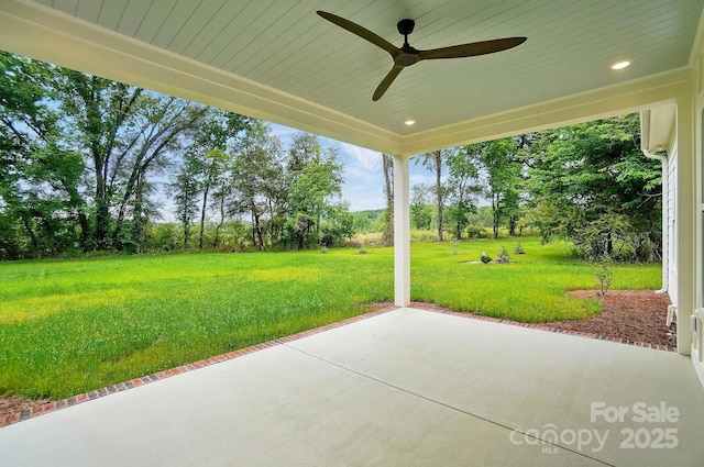 9311 Simpson Rd, Waxhaw, NC 28173 - view of patio / terrace with a ceiling fan and view of wooded area