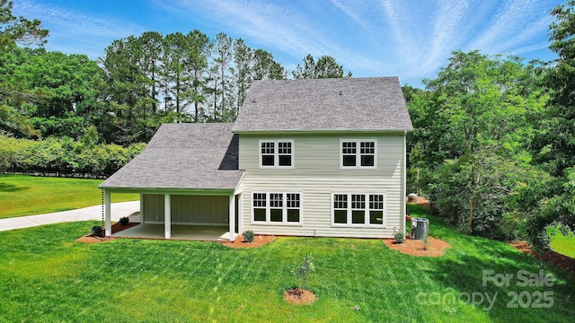 9315 Simpson Rd, Waxhaw, NC 28173 - rear view of property featuring a patio area, a yard, central AC, and a shingled roof