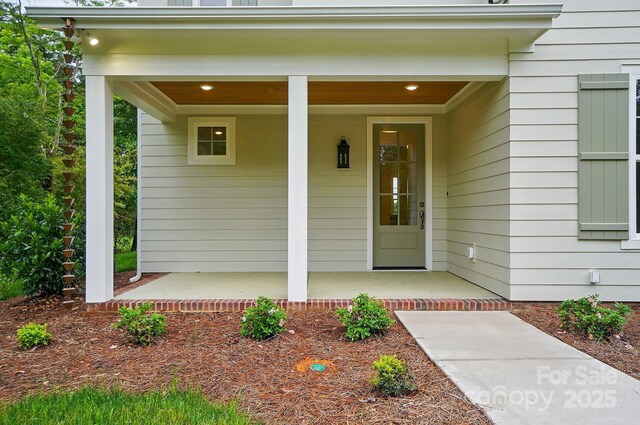 9315 Simpson Rd, Waxhaw, NC 28173 - view of exterior entry with a porch