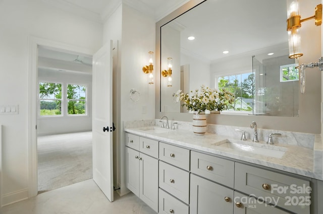 9315 Simpson Rd, Waxhaw, NC 28173 - full bathroom featuring crown molding, double vanity, and recessed lighting