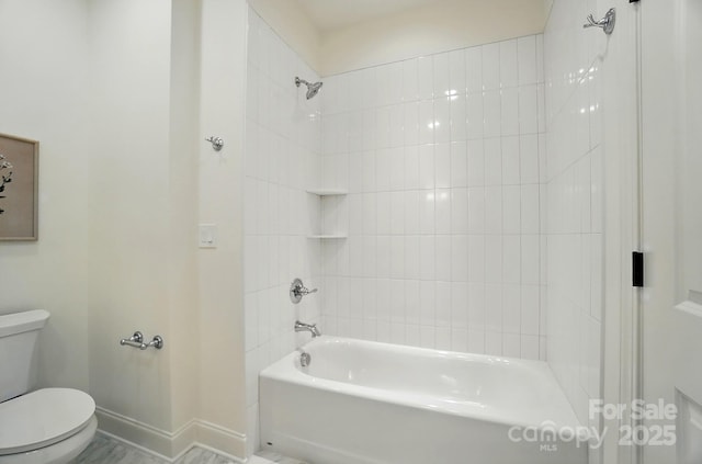 9315 Simpson Rd, Waxhaw, NC 28173 - full bath with toilet, baseboards, and shower / washtub combination