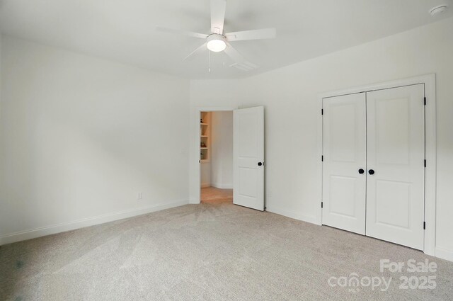 9315 Simpson Rd, Waxhaw, NC 28173 - unfurnished bedroom featuring carpet flooring, a closet, baseboards, and ceiling fan