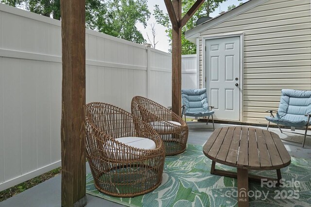 327 Wilkes Place Dr, Fort Mill, SC 29715 - view of patio featuring fence