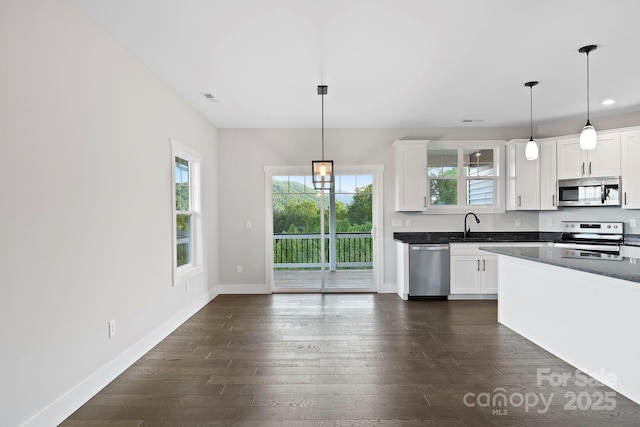 505 Sky Ridge Dr Unit 57, Leicester, NC 28748 - kitchen with stainless steel appliances, plenty of natural light, dark countertops, and recessed lighting