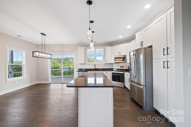 505 Sky Ridge Dr Unit 57, Leicester, NC 28748 - kitchen with stainless steel appliances, healthy amount of natural light, a center island, recessed lighting, and baseboards