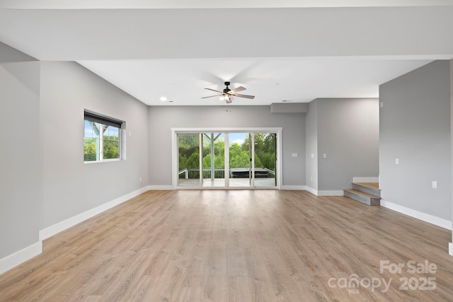 505 Sky Ridge Dr Unit 57, Leicester, NC 28748 - unfurnished living room featuring baseboards, light wood-style flooring, ceiling fan, and recessed lighting