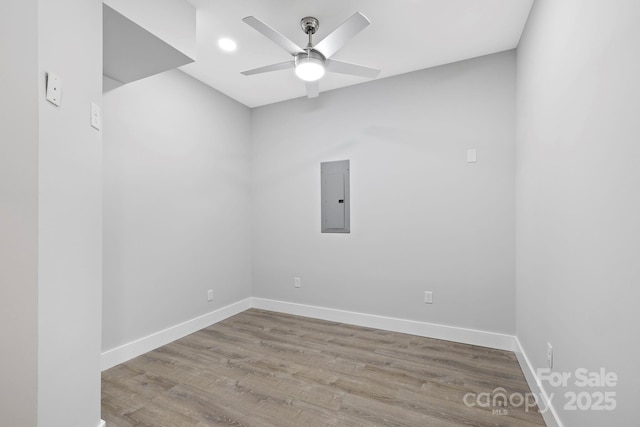 505 Sky Ridge Dr Unit 57, Leicester, NC 28748 - unfurnished room featuring electric panel, ceiling fan, baseboards, wood finished floors, and recessed lighting