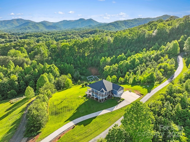 505 Sky Ridge Dr Unit 57, Leicester, NC 28748 - view from above of property with a heavily wooded area and a mountain backdrop