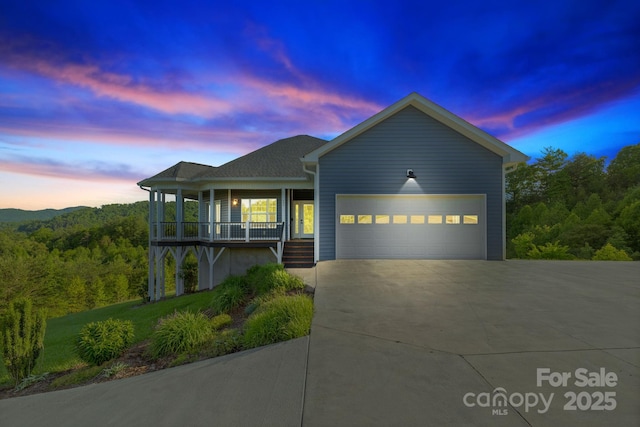 505 Sky Ridge Dr Unit 57, Leicester, NC 28748 - view of front facade with a porch, driveway, and an attached garage