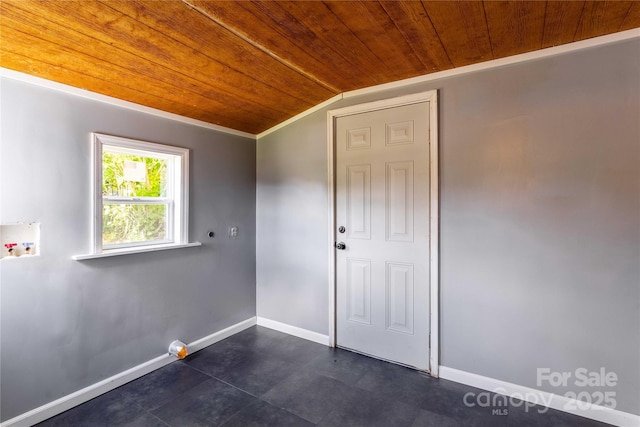 unfurnished room featuring wooden ceiling, lofted ceiling, and baseboards